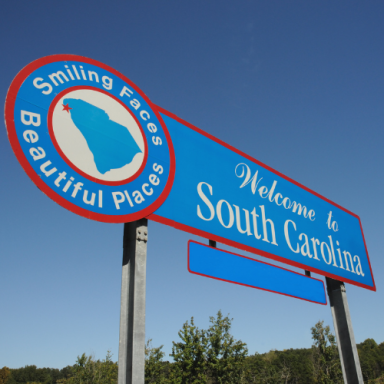 Welcome sign for South Carolina featuring a map outline and a vibrant design.