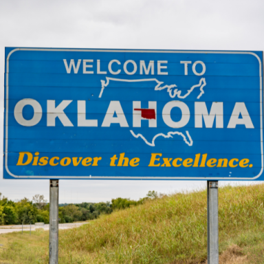 Welcome sign for Oklahoma with the phrase "Discover the Excellence."