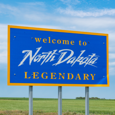 Welcome sign for North Dakota with "Legendary" in bold letters.